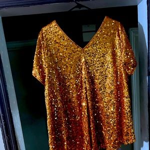Amazing sequence top. Can be dressed up or down.